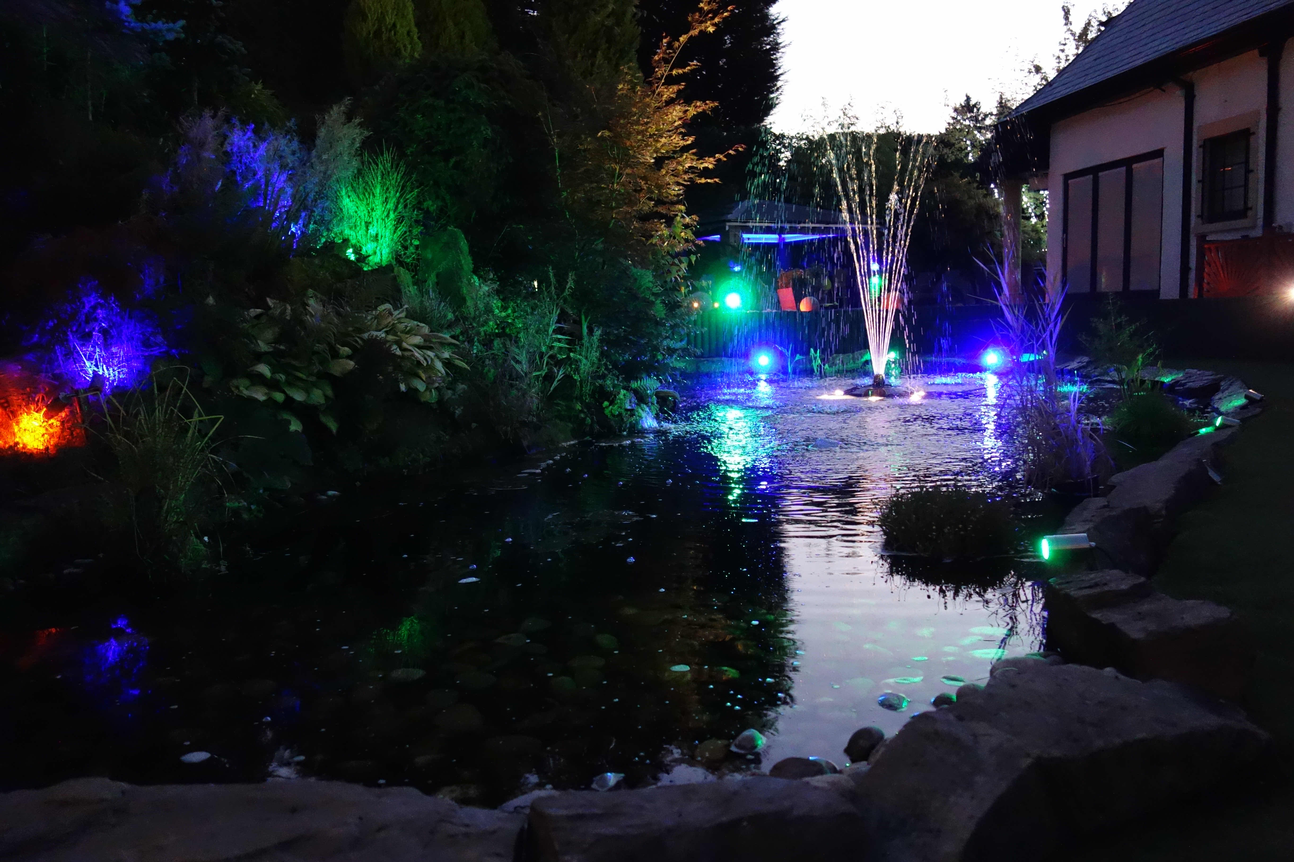 Pond with fountain and pond lights in Knutsford.