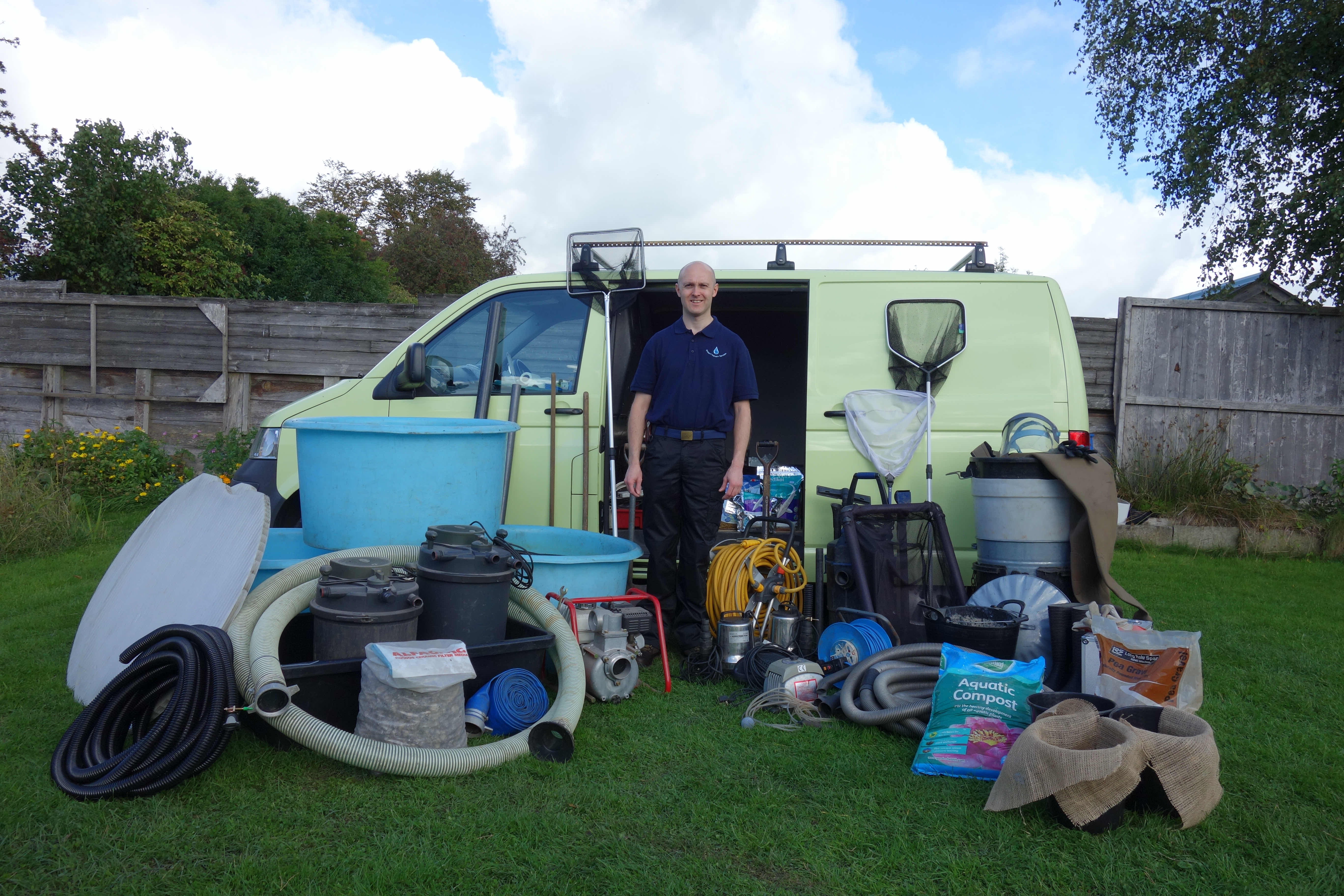 Daniel Green, proprietor of Green's Aquatic Services, with van and pond maintenance equipment.